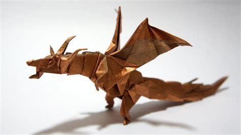 In this video I teach how to make a dragon out of paper which is very easy considering the level of detail. I found a similar version on the internet, but I ...